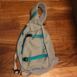 Silver & Teal Patagonia 8L Atom Sling